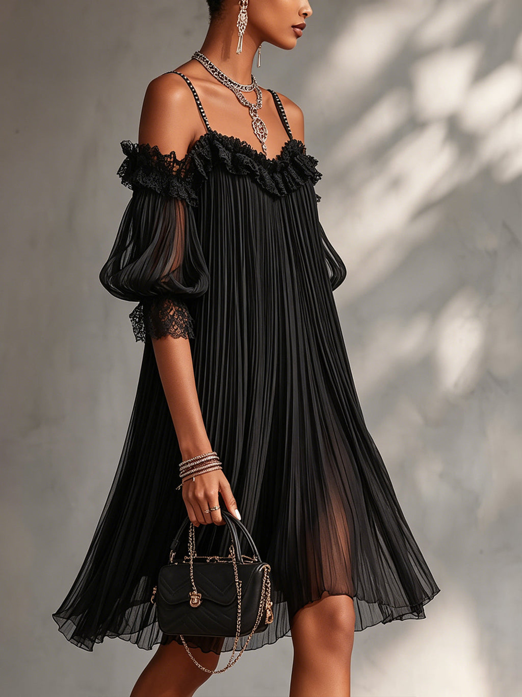 VITTORIA | MINI VESTIDO NEGRO DE MUSLINA CON HOMBROS DESCUBIERTOS Y BORDES DE ENCANTO