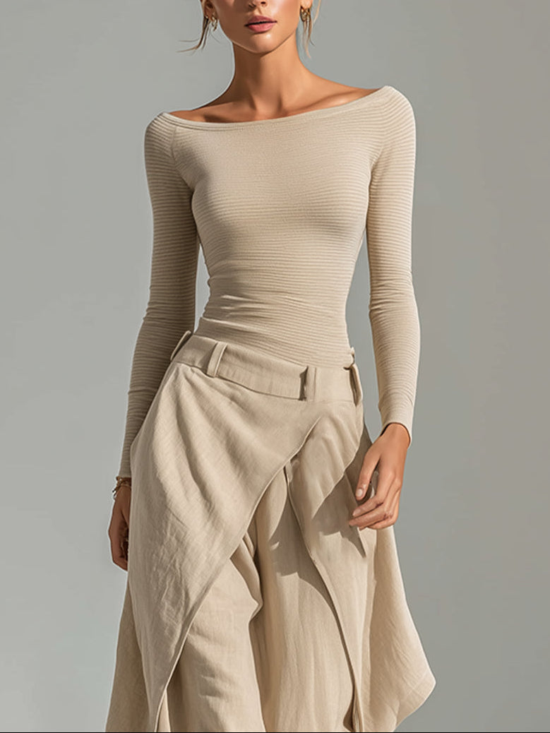 Top beige con escote barco y pantalones de pierna ancha superpuestos.