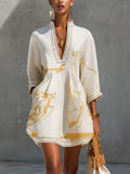 Vestido mini de encaje de ganchillo con estampado dorado marfil
