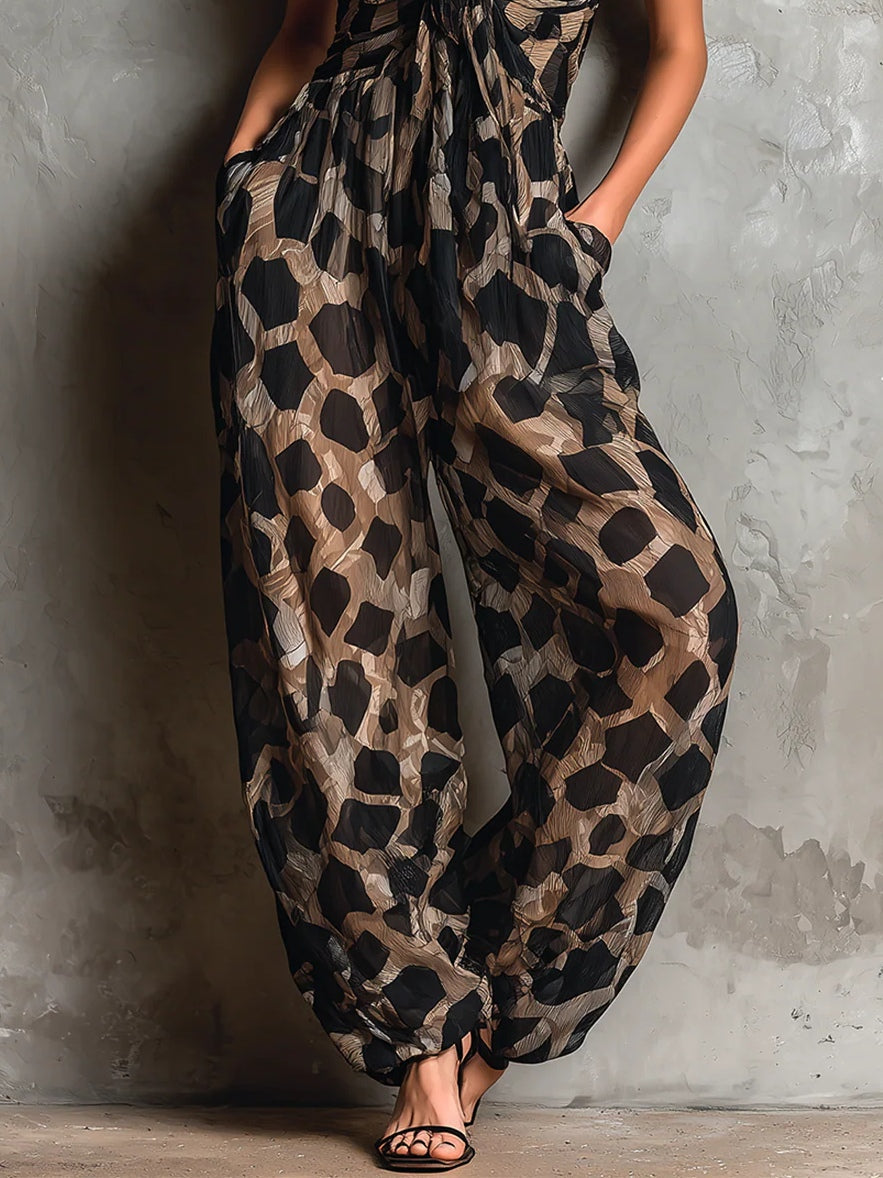 Mono de gasa suelto con cuello halter y estampado animal negro